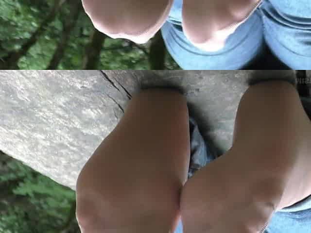 Jeans Feet In Nylon Socks In The Forest