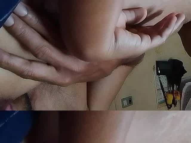 Husband and wife massage her breasts at home