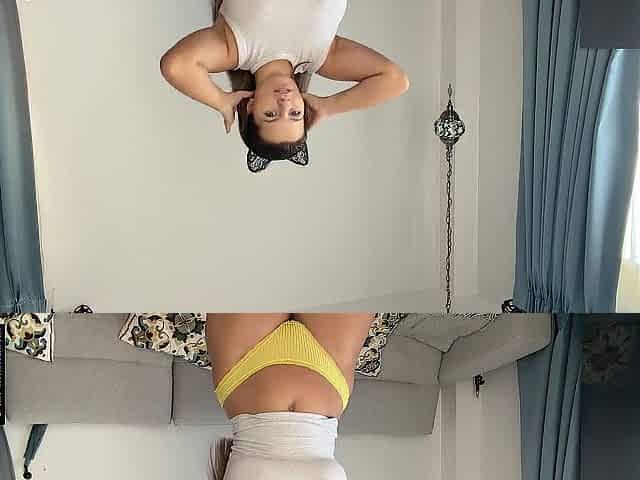 Curvy brunette hair shows her massive breasts and large booty when try on