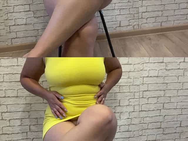 Hot slut with big tits caressing cunt in erotic dress