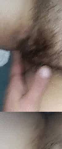 My wife's hirsute moist vagina close-up
