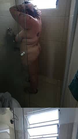 big beautiful woman takes a shower after gym