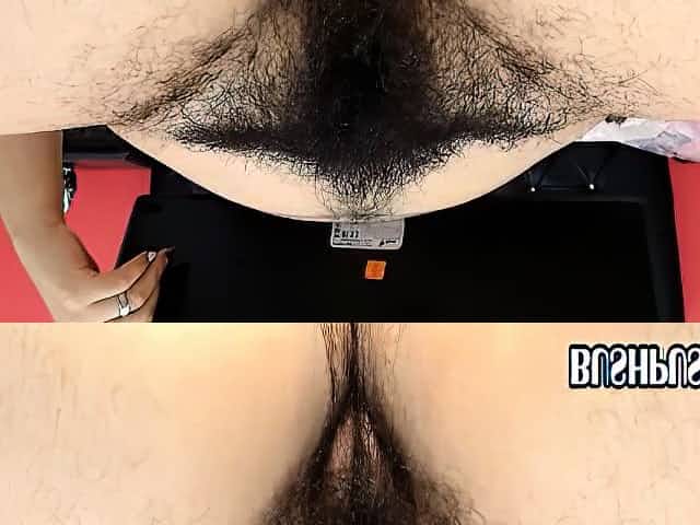 Chubby hairy brunette rubs her bush pussy