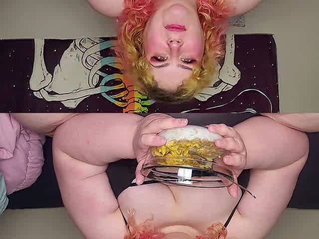 Obese woman eating frosted flakes