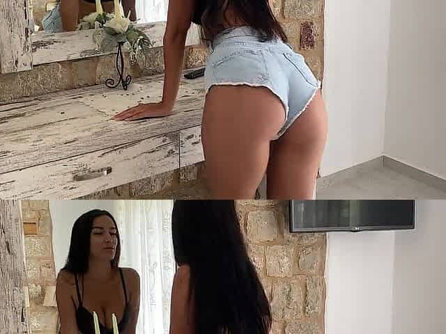 Brunette hair with large bazookas masturbates in front of the mirror