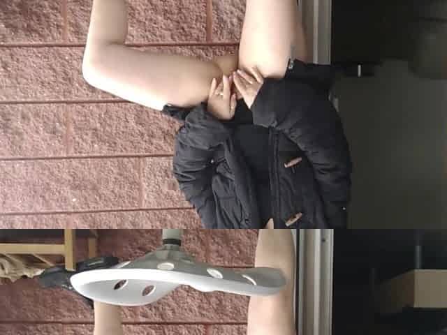 exhibitionist urinates with vagina lips open on a immodest chair on balcony