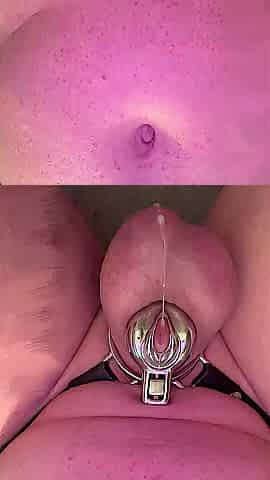 Riding my sex toy in the shower and trickling cum from my caged clitty