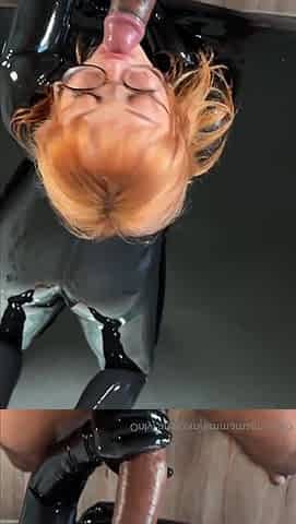 Redhead Babe In A Latex Suit Hot Video