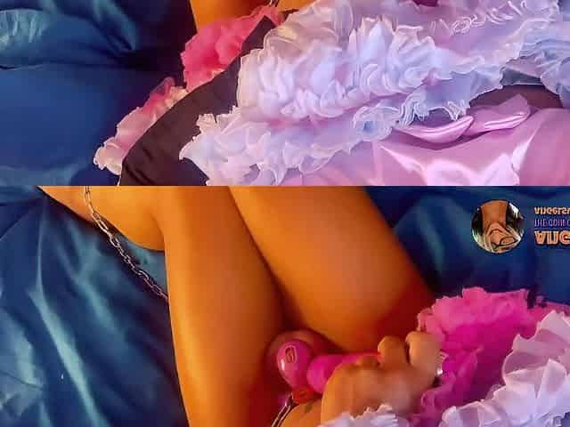 girl ebony wanks her caged clitty with a wand