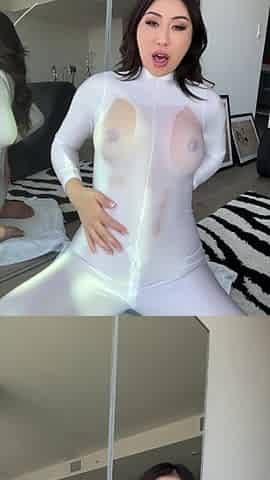 Asian hotness Nicole Doshi is having some personal fun with a bodysuit