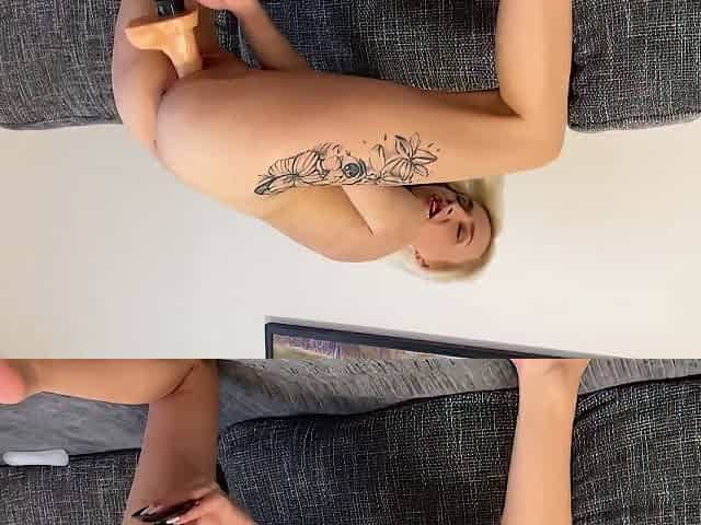Petite Cougar Plays With A Big Dildo On The Couch