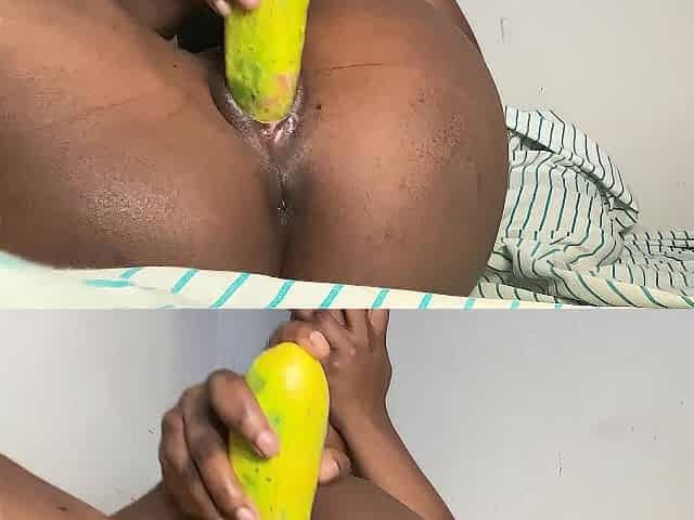 Lustful Black bangs a cucumber and ble*ds
