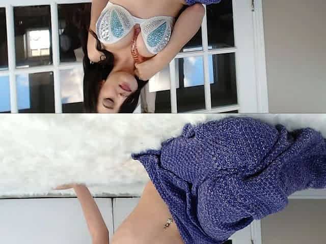 Busty babe playing with her big boobs