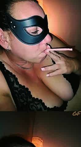 with a cigarette in couch