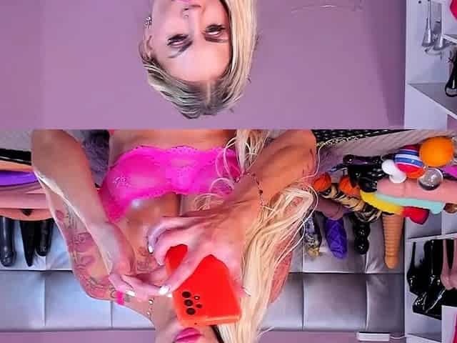 Blonde mature with big boobs masturbates in bed