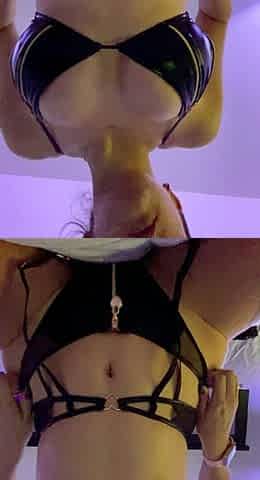 Busty babe playing with her big boobs