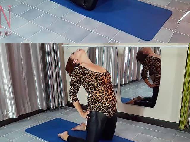 Regina Noir. Yoga in hawt leotards and latex leggings is doing yoga in the gym. two