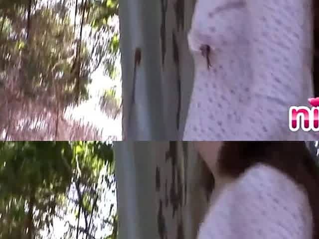 Lesbian nina fingers her pussy in the forest for her fans