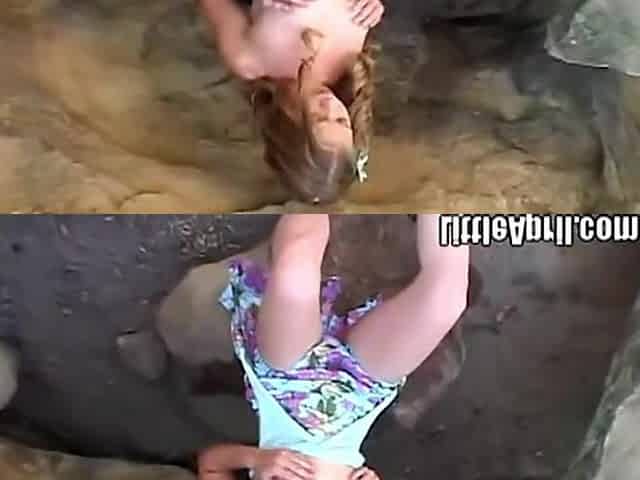 Little April rubbing and fingering her vagina at beach