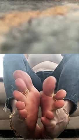 Brunette with foot fetish rubs big dick with her feet in POV