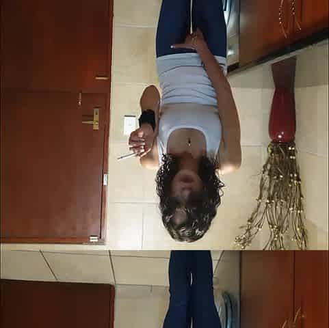 Petite Smoking Girl Pissing in Her Pants While Smoking a Cigarette