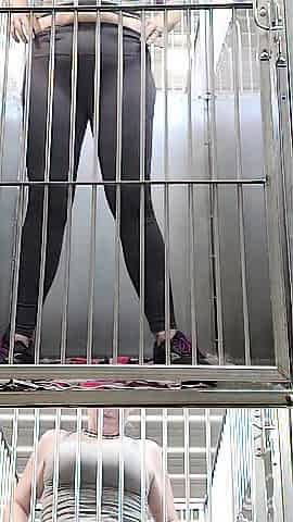 Risky Squirting In A Cage At Work