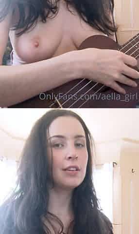 Busty babe playing with her big boobs
