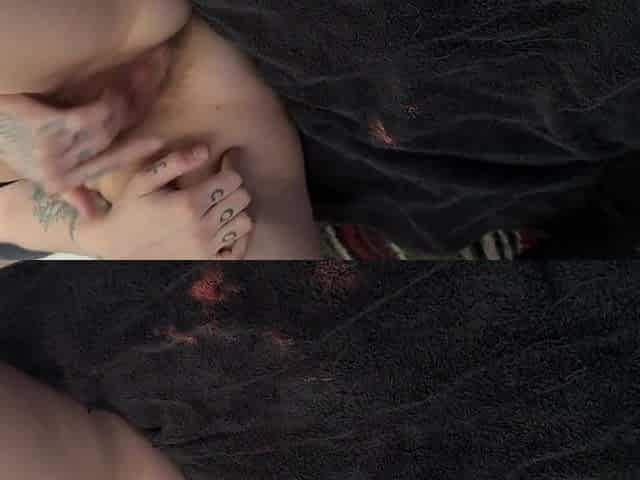 Tattooed beauty masturbates with toys