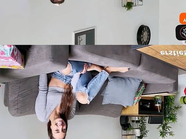 Brunette with yam-sized fun bags plays solo with toys