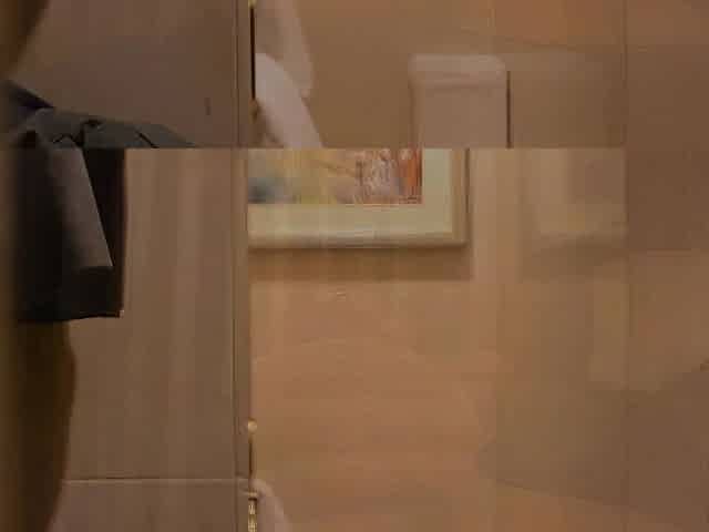 Lonely Oriental Business Traveler Relieves Himself in the Hotel Room