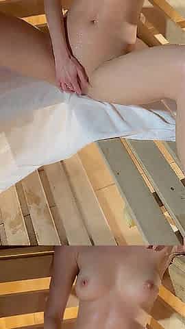 Nude woman in sauna