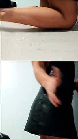 Lovely Dolly lifts her leather skirt to sit on a rubber cock