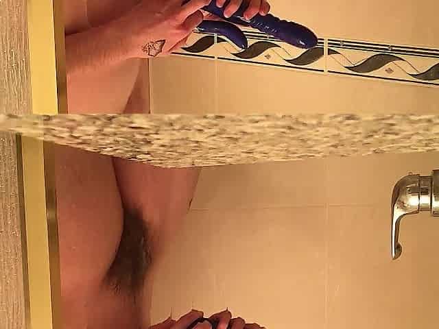 Ftm plays with his sextoy in the shower