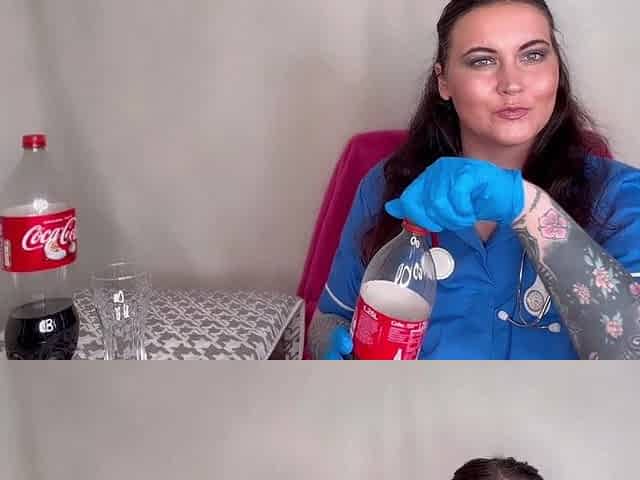 Nurse Ffw Having Fizzy Drink and Burping