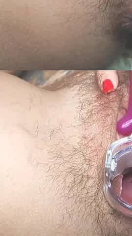 Open pussy using a speculum_orgasm in close up during