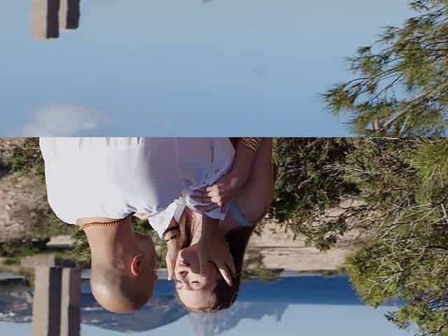 Stacy Cruz and Christian Clay have fun by the pool