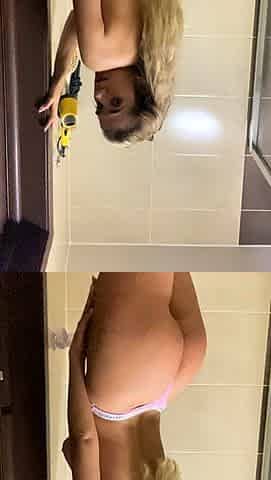 Hot babe with perfect big boobs taking shower
