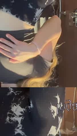 Petite Blonde Girl Doing a Striptease