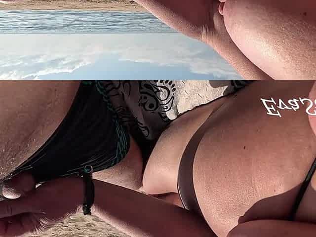 tugjob on a public beach by the sea