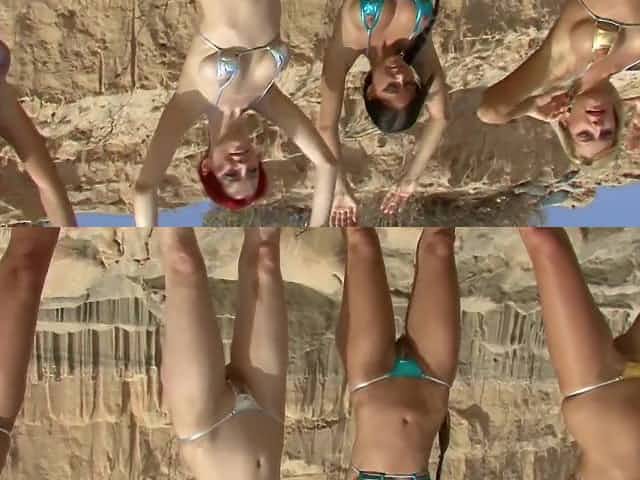 Young lovely and nude girls posing on the sea beach