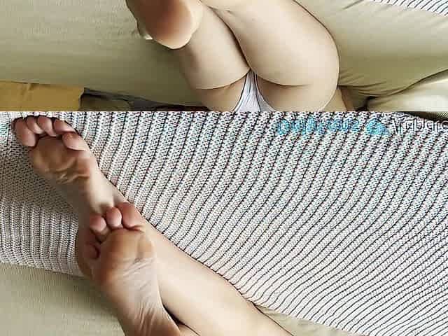 Large Butt Golden-haired showing her feet and soles on a sunny day