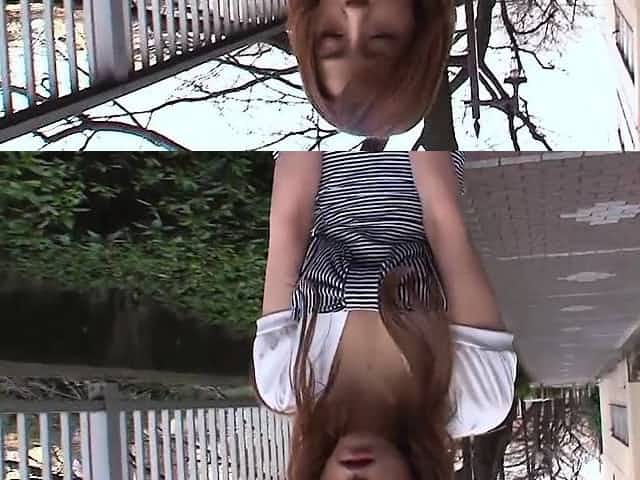 Asian cutie in high heels keeps a toy in her jeans
