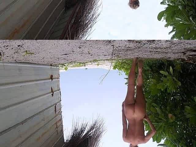 Blonde Solo Girl in the Jungle Strips by the Ocean