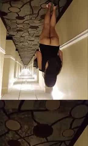 Naked Asian MILF in a Hotel Hallway
