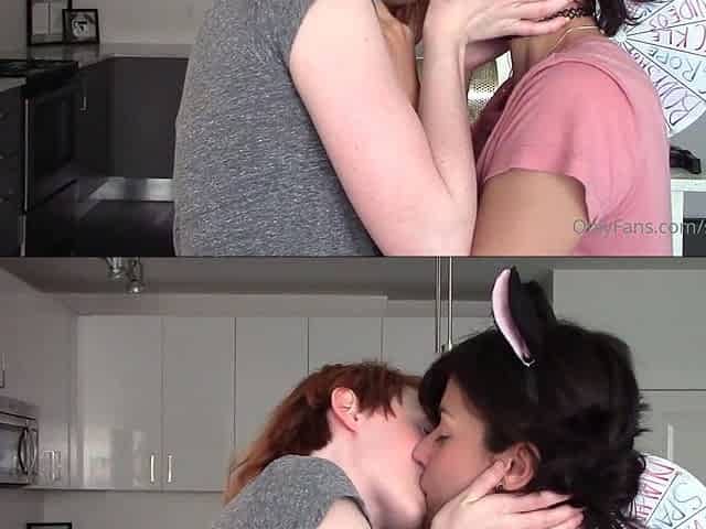 Redhead and brunette lesbians make out