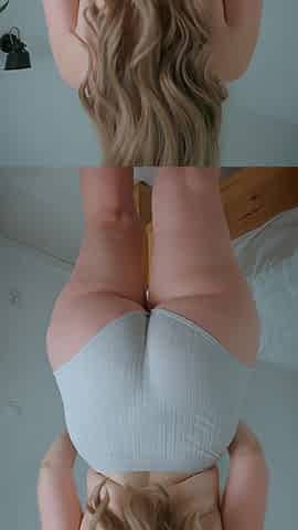 MILF Turns Around and Smiles with Her Large Breasts