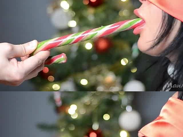 Smutty Santa put his candy in her throat