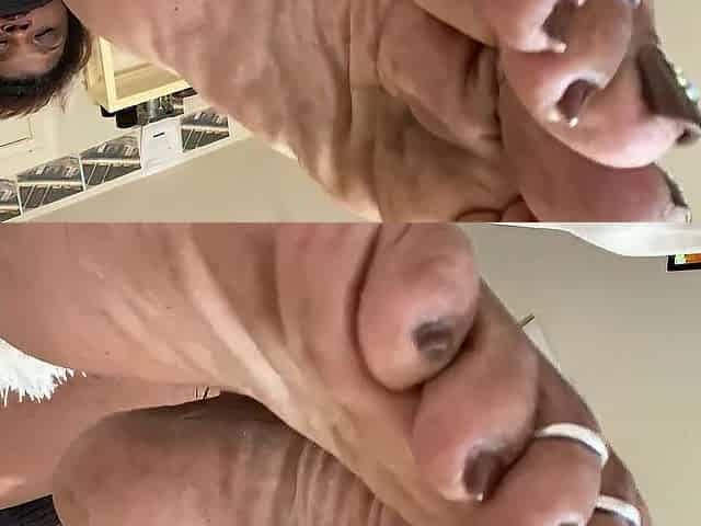 Foot soles and painted toes