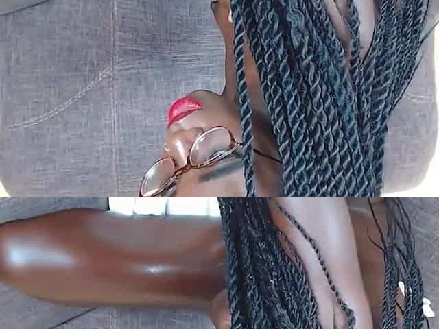 mature Black cam girl spanks her asshole with black dildo