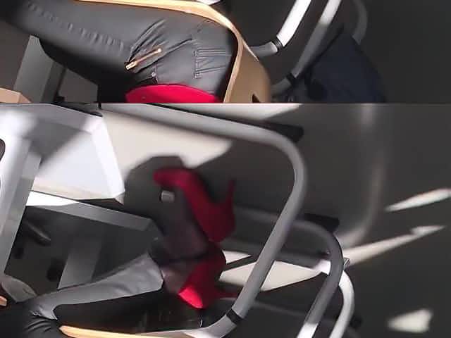 secretary in nylon socks and red high heels